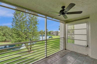 Experience resort-style living in this spacious 2-bedroom on Pine Island Ridge Country Club in Florida - for sale on GolfHomes.com, golf home, golf lot