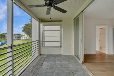 Experience resort-style living in this spacious 2-bedroom on Pine Island Ridge Country Club in Florida - for sale on GolfHomes.com, golf home, golf lot