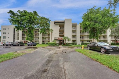 Experience resort-style living in this spacious 2-bedroom on Pine Island Ridge Country Club in Florida - for sale on GolfHomes.com, golf home, golf lot