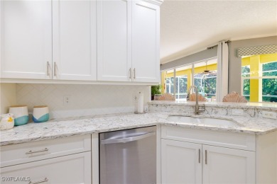Modern comfort meets timeless charm in this exceptional on Herons Glen Golf and Country Club in Florida - for sale on GolfHomes.com, golf home, golf lot