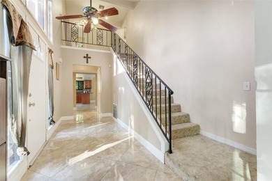 Not your cookie-cutter home.  This lovely Tudor offers character on Orange Tree Golf Club in Florida - for sale on GolfHomes.com, golf home, golf lot