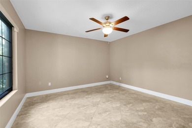 Not your cookie-cutter home.  This lovely Tudor offers character on Orange Tree Golf Club in Florida - for sale on GolfHomes.com, golf home, golf lot