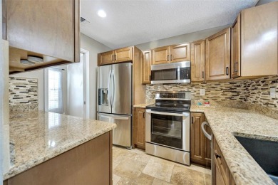 Welcome to this beautifully updated 2-bedroom, 2.5-bath townhome on Northdale Golf and Tennis Club in Florida - for sale on GolfHomes.com, golf home, golf lot