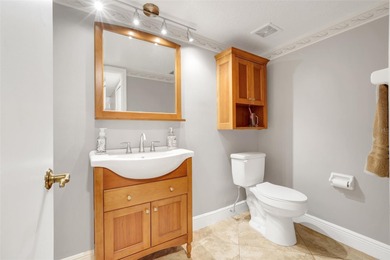 Not your cookie-cutter home.  This lovely Tudor offers character on Orange Tree Golf Club in Florida - for sale on GolfHomes.com, golf home, golf lot