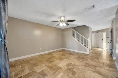 Welcome to this beautifully updated 2-bedroom, 2.5-bath townhome on Northdale Golf and Tennis Club in Florida - for sale on GolfHomes.com, golf home, golf lot