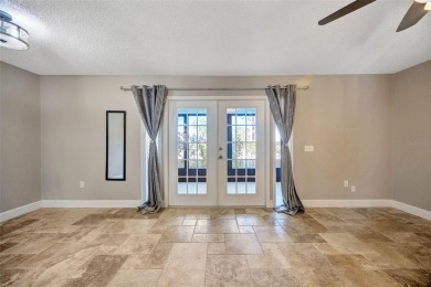 Welcome to this beautifully updated 2-bedroom, 2.5-bath townhome on Northdale Golf and Tennis Club in Florida - for sale on GolfHomes.com, golf home, golf lot