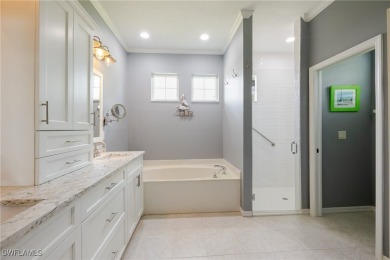 Modern comfort meets timeless charm in this exceptional on Herons Glen Golf and Country Club in Florida - for sale on GolfHomes.com, golf home, golf lot