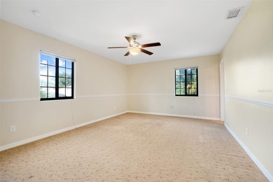 Not your cookie-cutter home.  This lovely Tudor offers character on Orange Tree Golf Club in Florida - for sale on GolfHomes.com, golf home, golf lot