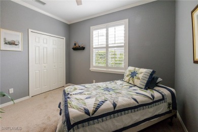 Modern comfort meets timeless charm in this exceptional on Herons Glen Golf and Country Club in Florida - for sale on GolfHomes.com, golf home, golf lot