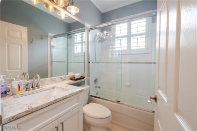 Modern comfort meets timeless charm in this exceptional on Herons Glen Golf and Country Club in Florida - for sale on GolfHomes.com, golf home, golf lot