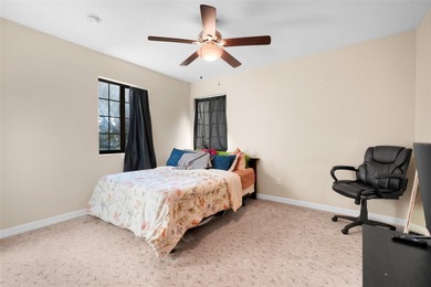 Not your cookie-cutter home.  This lovely Tudor offers character on Orange Tree Golf Club in Florida - for sale on GolfHomes.com, golf home, golf lot