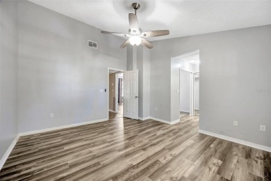 Welcome to this beautifully updated 2-bedroom, 2.5-bath townhome on Northdale Golf and Tennis Club in Florida - for sale on GolfHomes.com, golf home, golf lot