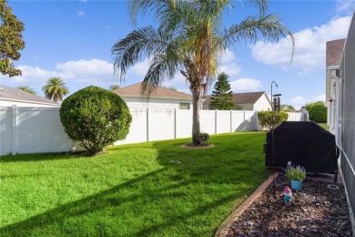 PRICE REDUCTION! This beautifully landscaped 3/2 AT EASE model on Yankee Clipper Executive Golf Course in Florida - for sale on GolfHomes.com, golf home, golf lot