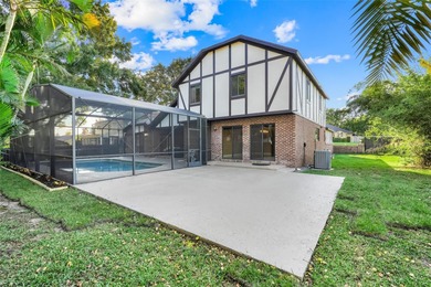 Not your cookie-cutter home.  This lovely Tudor offers character on Orange Tree Golf Club in Florida - for sale on GolfHomes.com, golf home, golf lot