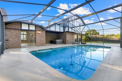 Not your cookie-cutter home.  This lovely Tudor offers character on Orange Tree Golf Club in Florida - for sale on GolfHomes.com, golf home, golf lot