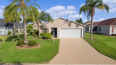 PRICE REDUCTION! This beautifully landscaped 3/2 AT EASE model on Yankee Clipper Executive Golf Course in Florida - for sale on GolfHomes.com, golf home, golf lot