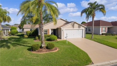 PRICE REDUCTION! This beautifully landscaped 3/2 AT EASE model on Yankee Clipper Executive Golf Course in Florida - for sale on GolfHomes.com, golf home, golf lot