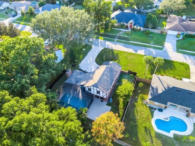 Not your cookie-cutter home.  This lovely Tudor offers character on Orange Tree Golf Club in Florida - for sale on GolfHomes.com, golf home, golf lot