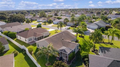 PRICE REDUCTION! This beautifully landscaped 3/2 AT EASE model on Yankee Clipper Executive Golf Course in Florida - for sale on GolfHomes.com, golf home, golf lot