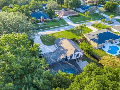 Not your cookie-cutter home.  This lovely Tudor offers character on Orange Tree Golf Club in Florida - for sale on GolfHomes.com, golf home, golf lot