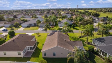 PRICE REDUCTION! This beautifully landscaped 3/2 AT EASE model on Yankee Clipper Executive Golf Course in Florida - for sale on GolfHomes.com, golf home, golf lot