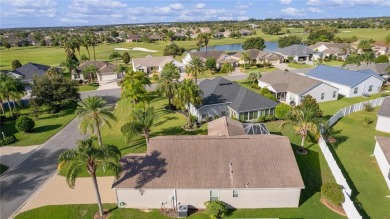 PRICE REDUCTION! This beautifully landscaped 3/2 AT EASE model on Yankee Clipper Executive Golf Course in Florida - for sale on GolfHomes.com, golf home, golf lot