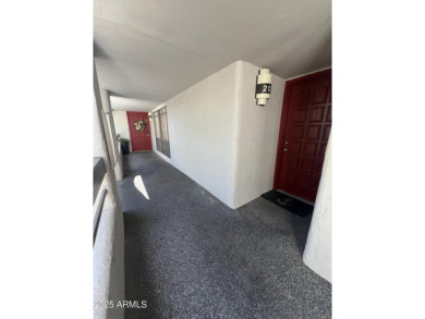 This spacious upper level condo gets tons of light, has a new on Arizona Biltmore Golf and Country Club in Arizona - for sale on GolfHomes.com, golf home, golf lot