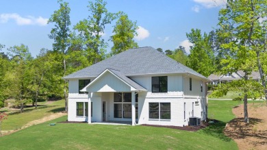 THIS GORGEOUS NEW CONSTRUCTION IS DIRECTLY ON OSPREY POINTE POND on Harbor Club Golf and Country Club in Georgia - for sale on GolfHomes.com, golf home, golf lot