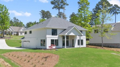 THIS GORGEOUS NEW CONSTRUCTION IS DIRECTLY ON OSPREY POINTE POND on Harbor Club Golf and Country Club in Georgia - for sale on GolfHomes.com, golf home, golf lot
