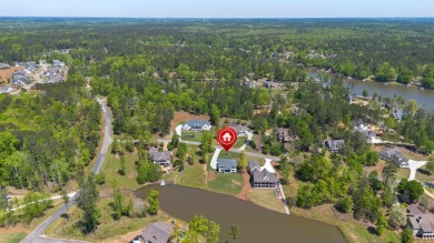 THIS GORGEOUS NEW CONSTRUCTION IS DIRECTLY ON OSPREY POINTE POND on Harbor Club Golf and Country Club in Georgia - for sale on GolfHomes.com, golf home, golf lot