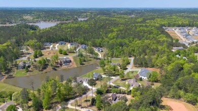 THIS GORGEOUS NEW CONSTRUCTION IS DIRECTLY ON OSPREY POINTE POND on Harbor Club Golf and Country Club in Georgia - for sale on GolfHomes.com, golf home, golf lot