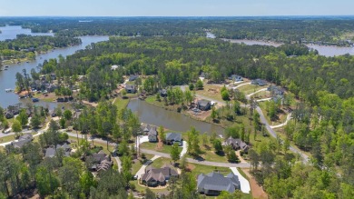 THIS GORGEOUS NEW CONSTRUCTION IS DIRECTLY ON OSPREY POINTE POND on Harbor Club Golf and Country Club in Georgia - for sale on GolfHomes.com, golf home, golf lot