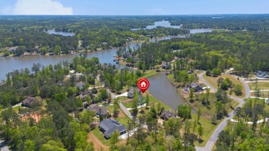 THIS GORGEOUS NEW CONSTRUCTION IS DIRECTLY ON OSPREY POINTE POND on Harbor Club Golf and Country Club in Georgia - for sale on GolfHomes.com, golf home, golf lot