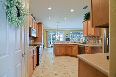 Jaw-dropping and absolutely gorgeous, this three-bedroom on Eagle Ridge At Spruce Creek Country Club in Florida - for sale on GolfHomes.com, golf home, golf lot