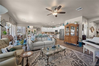 Beautiful home located in the gated community of The Enclave at on Laughlin Ranch Golf Club in Arizona - for sale on GolfHomes.com, golf home, golf lot