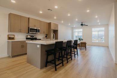 Just minutes from Sunbrook Golf Course, this beautiful 4-bedroom on Sunbrook Golf Course in Utah - for sale on GolfHomes.com, golf home, golf lot