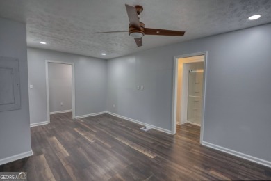 Welcome to this stunning, fully renovated home in the highly on Turtle Cove Golf Course in Georgia - for sale on GolfHomes.com, golf home, golf lot