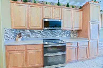 Jaw-dropping and absolutely gorgeous, this three-bedroom on Eagle Ridge At Spruce Creek Country Club in Florida - for sale on GolfHomes.com, golf home, golf lot