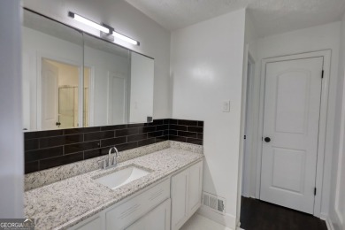 Welcome to this stunning, fully renovated home in the highly on Turtle Cove Golf Course in Georgia - for sale on GolfHomes.com, golf home, golf lot