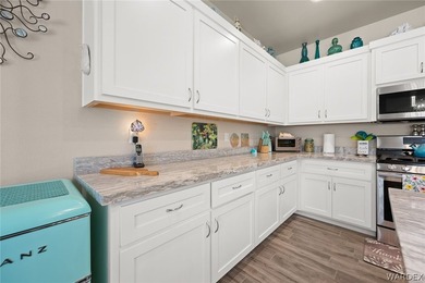 Beautiful home located in the gated community of The Enclave at on Laughlin Ranch Golf Club in Arizona - for sale on GolfHomes.com, golf home, golf lot