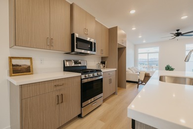 Just minutes from Sunbrook Golf Course, this beautiful 4-bedroom on Sunbrook Golf Course in Utah - for sale on GolfHomes.com, golf home, golf lot