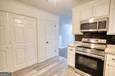 Welcome to this stunning, fully renovated home in the highly on Turtle Cove Golf Course in Georgia - for sale on GolfHomes.com, golf home, golf lot
