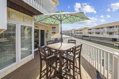Experience the ultimate in coastal living with this 1-bedroom on Sandpiper Cove Golf Course in Florida - for sale on GolfHomes.com, golf home, golf lot