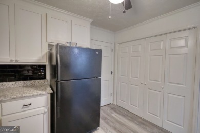 Welcome to this stunning, fully renovated home in the highly on Turtle Cove Golf Course in Georgia - for sale on GolfHomes.com, golf home, golf lot