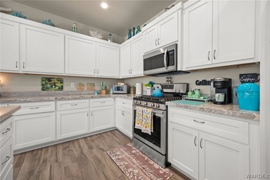 Beautiful home located in the gated community of The Enclave at on Laughlin Ranch Golf Club in Arizona - for sale on GolfHomes.com, golf home, golf lot