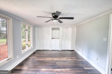 Welcome to this stunning, fully renovated home in the highly on Turtle Cove Golf Course in Georgia - for sale on GolfHomes.com, golf home, golf lot