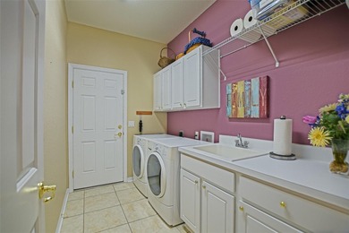 Jaw-dropping and absolutely gorgeous, this three-bedroom on Eagle Ridge At Spruce Creek Country Club in Florida - for sale on GolfHomes.com, golf home, golf lot