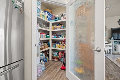 Beautiful home located in the gated community of The Enclave at on Laughlin Ranch Golf Club in Arizona - for sale on GolfHomes.com, golf home, golf lot