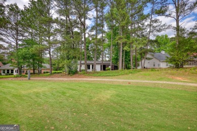 Welcome to this stunning, fully renovated home in the highly on Turtle Cove Golf Course in Georgia - for sale on GolfHomes.com, golf home, golf lot