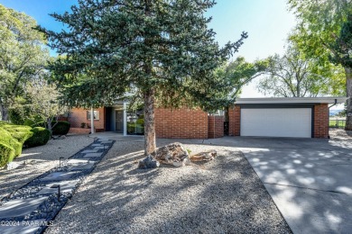 Move in ready! Super Cozy Frank Lloyd Wright type, red brick on Antelope Hills Golf Courses in Arizona - for sale on GolfHomes.com, golf home, golf lot